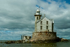 Middleground Lighthouse Made of Stone on Rocky Shoal
